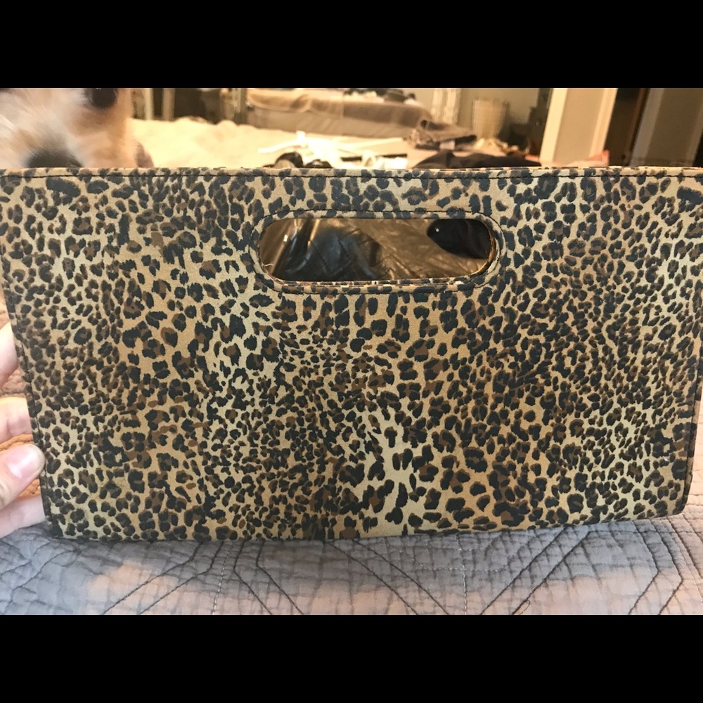 Express leopard clutch